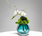 Decorative Green Plant Arrangement in Soft Vase